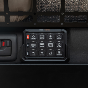 A close-up of the iTechworld 12 Gang Wireless Switch Panel, featuring labeled buttons for functions like air compressor, fridge, lights, and more—ideal for managing 4WD accessories and ensuring effortless system control.