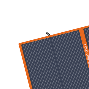 A close-up of the iTechworld 200W Solar Mat with Raptor Skin, featuring an orange border, black cells, and a seam labeled FOLD THIS—the perfect portable off-grid power solution.