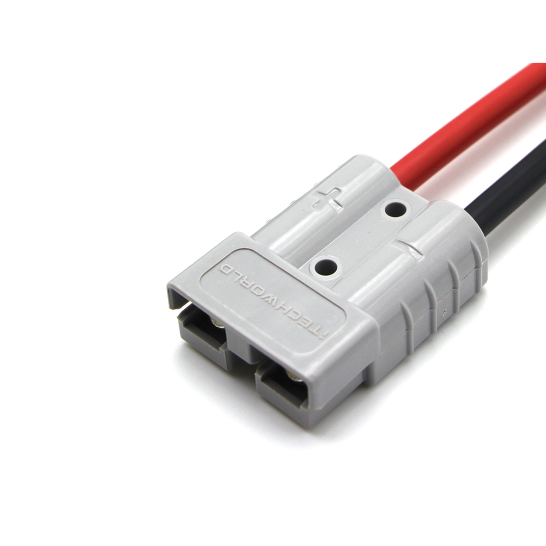 A close-up of the iTechworld Anderson Parallel | Cable | 50A shows a gray connector with red and black wires attached, plus/minus symbols, and TECHWORLD embossed—ideal for lithium batteries.