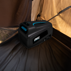 The iTechworld iFROST Portable Air Conditioner (1000W/3412BTU) rests on a tent floor as sunlight pours in—ideal for powering your camping air conditioner or keeping caravan cooling devices running on your outdoor trips.