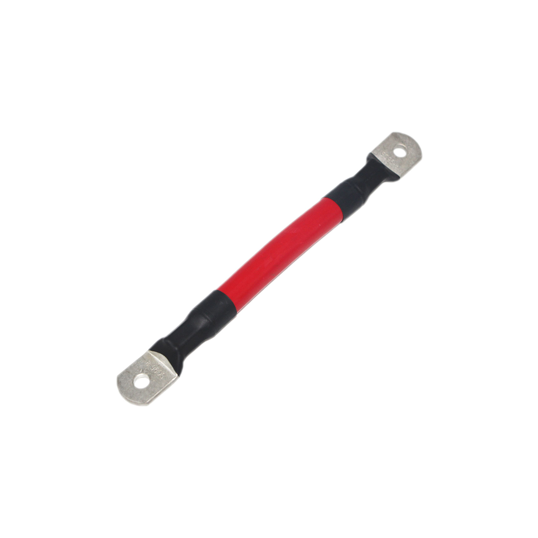 The iTechworld 000AWG Battery Parallel Cable is a short, red heavy-duty cable with metal ring terminals and black heat shrink tubing at each end, shown isolated on a white background.
