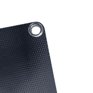 Close-up of the iTechworld Solar Panel Trickle Charger, 15W—black, textured surface with a metal grommet in the corner—shown against a white background.