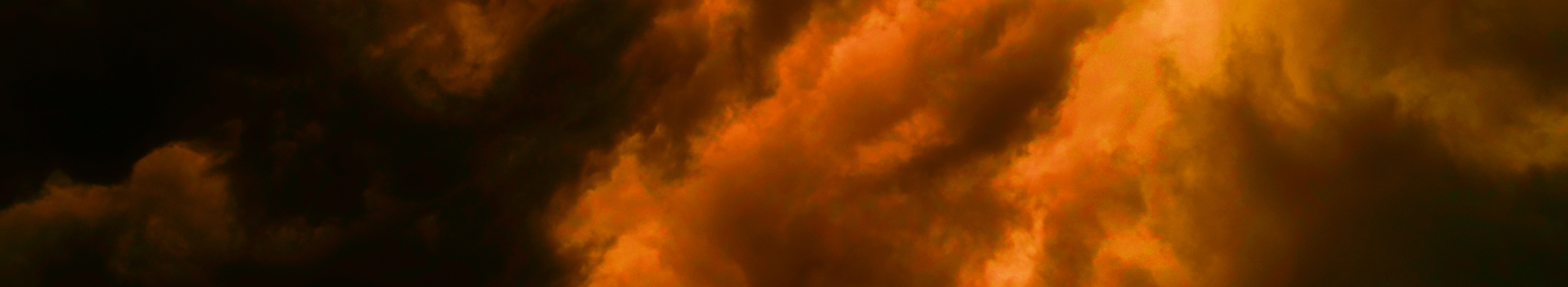 Bold yellow text reading March Madness is repeated over a dramatic, orange and black cloudy background. A yellow banner at the top and bottom says SALE ON NOW with decorative icons.