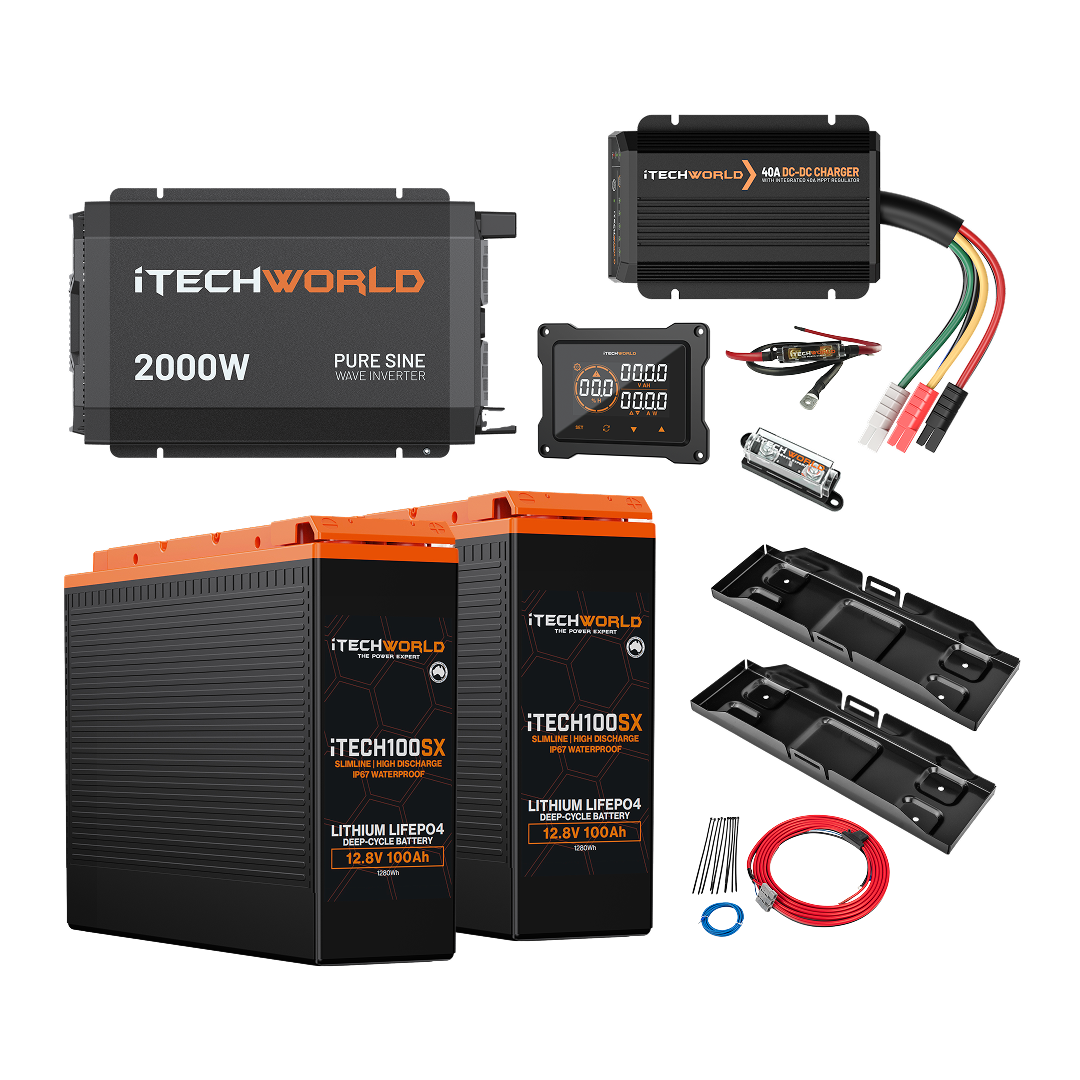 The iTechworld Complete Slimline 4WD Kit | 200Ah includes two large lithium batteries, a 2000W inverter, DC-DC charger, fuse, cables, connectors, battery trays, and a remote display—all against a white background.