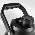 Close-up of the iTechworld | 3.8L Water Bottle, a black 304 stainless steel jug by iTechworld, featuring a sturdy textured handle and leak-proof screw-top lid, angled to highlight the handle and lid against a plain light background.