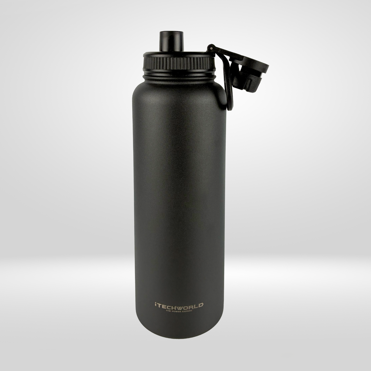 The iTechworld 1.2L Water Bottle by iTechworld, made of matte black stainless steel with a screw-on lid and flip-up spout, stands on a light gray background. Its double-wall vacuum design keeps drinks hot or cold and looks stylish.