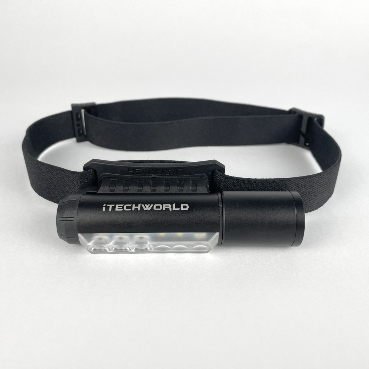 The iTechworld Magnetic Head Torch (450LM) features an adjustable elastic band and a front cylindrical LED light, shown on a white background. Perfect as a rechargeable flashlight or head torch for outdoor adventures.