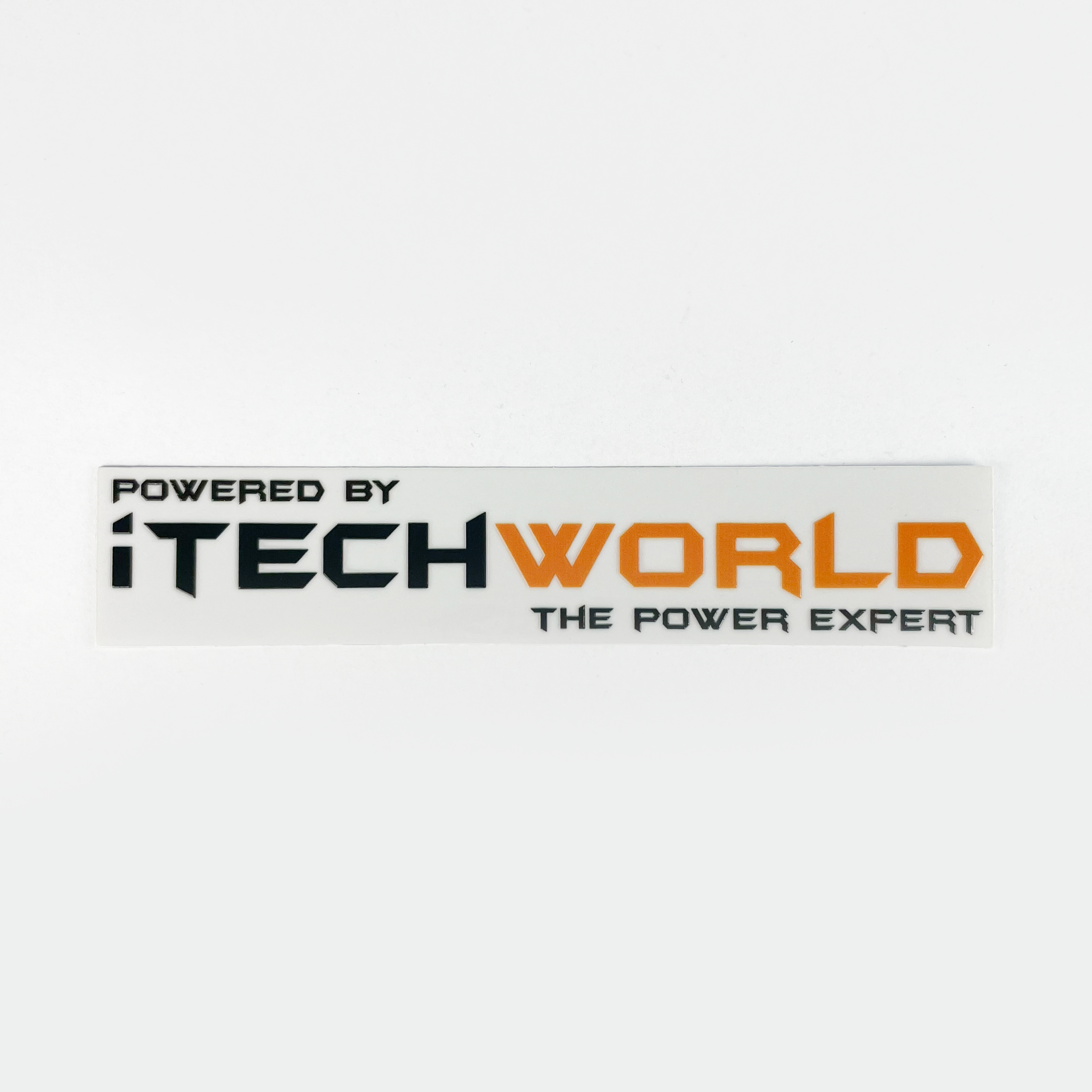A white, UV-resistant iTechworld sticker (S/M/L) featuring "POWERED BY iTECHWORLD THE POWER EXPERT" in bold black and orange block letters.