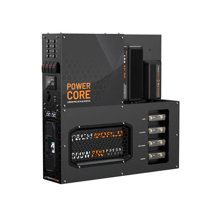 The iTechworld Power Core System + Super Slim 200Ah is a compact black power supply unit with multiple battery slots, honeycomb-patterned vents, and side power switches, featuring an industrial design.