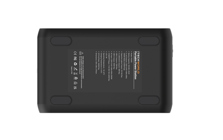 The iTechworld 1200W 80Ah PS1200 Portable Lithium Power Station with Bluetooth is shown in a black rectangular design, photographed from the bottom. It features four rubber feet and a central label displaying technical information, warnings, and certification symbols, all set against a white background.