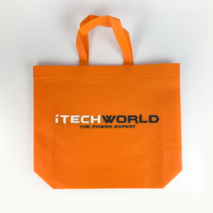 The iTechworld Tote Bag is a bright orange, reusable bag featuring "THE POWER EXPERT" text in black and white, two handles, and a flat bottom. Durable and stylish, this gear bag is shown on a white background.