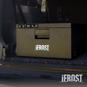 An iTechworld iFROST Drawer Fridge Freezer 31L is placed in a vehicle's trunk with the iFROST logo visible on the front. The image partially shows the fridge’s interior and the trunk’s carpeted surface.