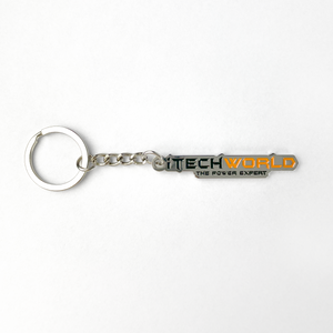 The iTechworld Iron Keyring features a CNC-cut iron rectangular tag with "TECHWORLD THE POWER EXPERT" in black, green, and orange on white, attached to a metal chain and keyring.
