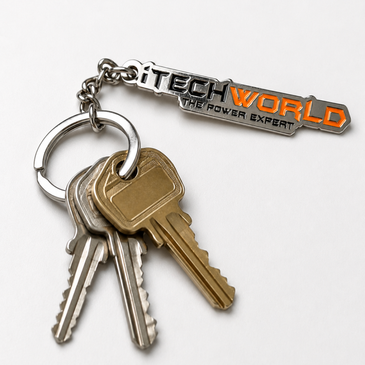 The iTechworld Iron Keyring showing what it would look like with your keys. Rectangular keychain featuring the black and orange "THE POWER EXPERT" branding, all placed on a white surface.